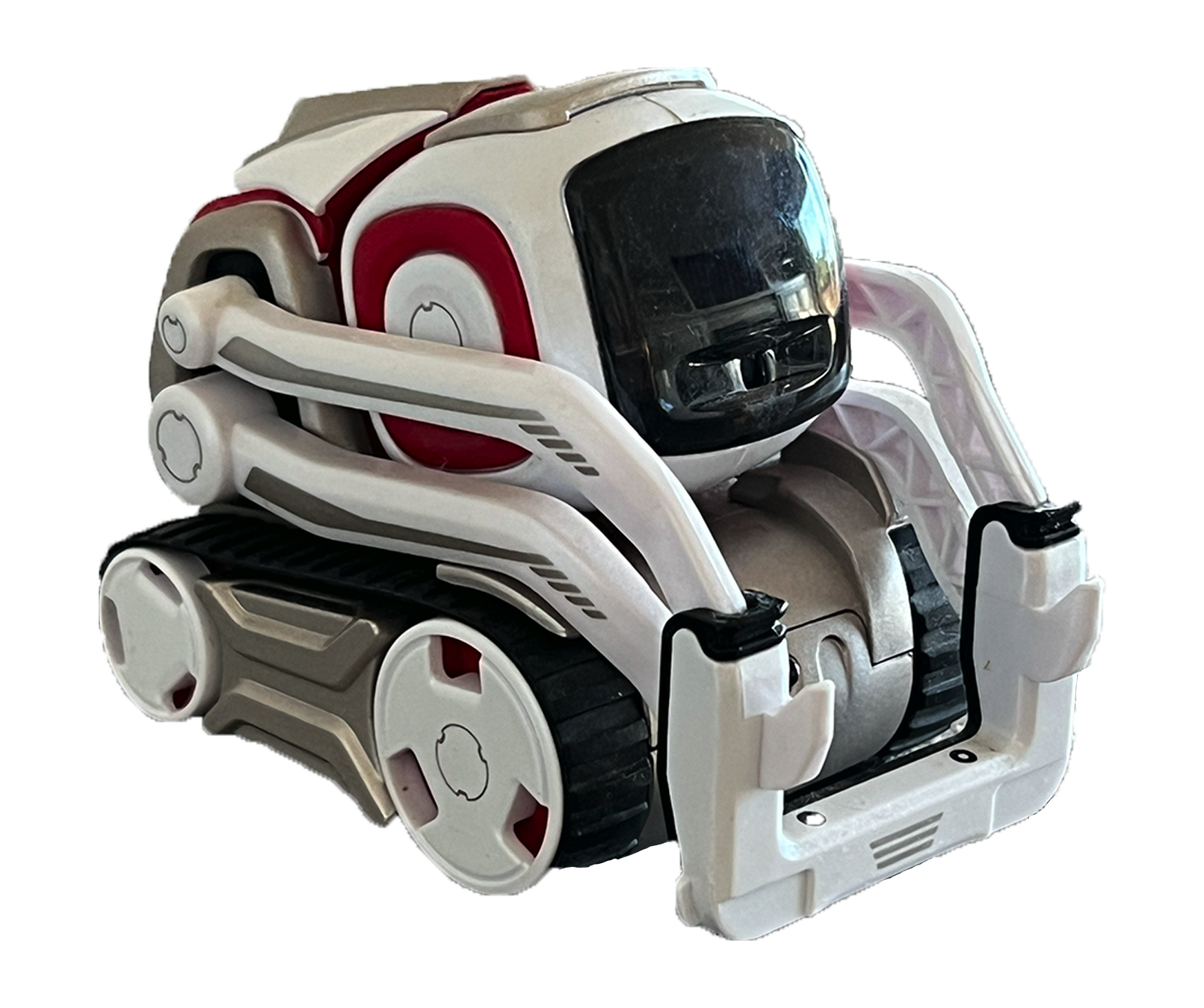 Cozmo, the small white-and-red social robot used in the New Delhi study, with treads, lifting arms, and a screen face