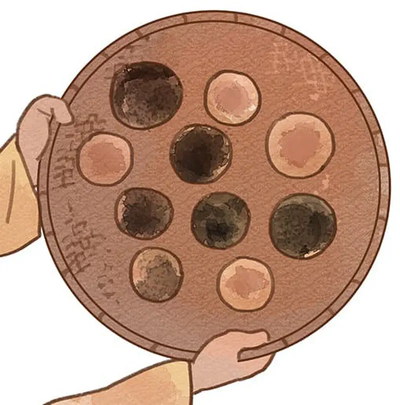 Close-up of hands holding round wooden tray with brown and light colored apam cakes