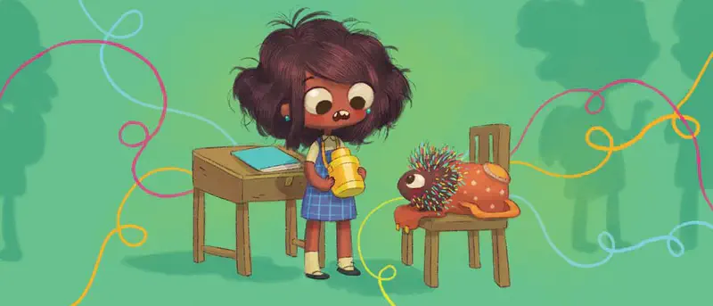 Boy and puppy cuddling together on couch under cozy blanket