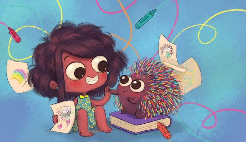 Boy and tan puppy running together through green grassy field