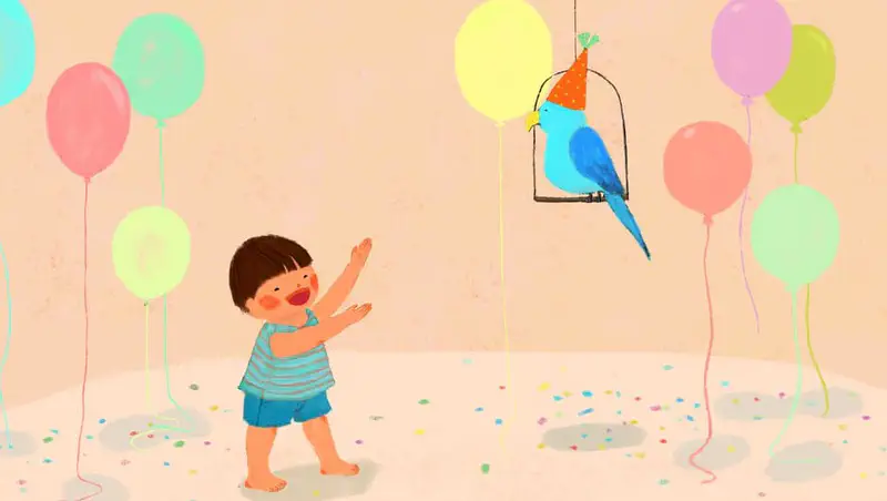 Happy boy clapping at blue parrot Butter wearing orange party hat surrounded by floating balloons