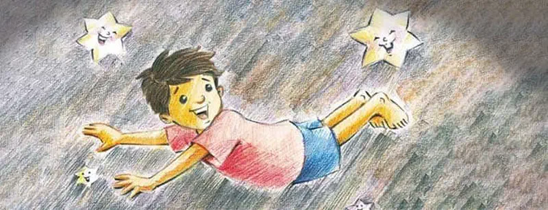Boy floating happily in space surrounded by smiling yellow stars against gray sky