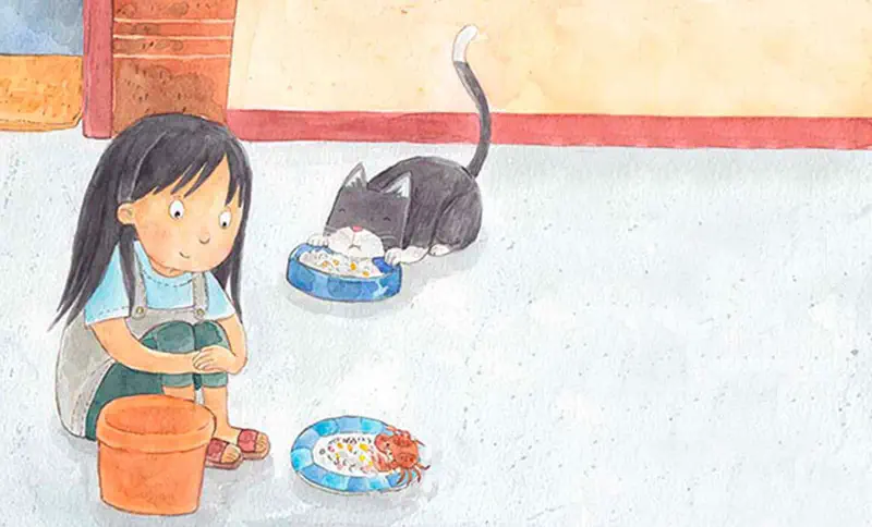 Girl sitting by bucket watching black cat eat from bowl while crab eats from plate
