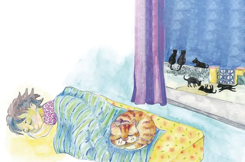 Boy sleeping peacefully under striped blanket with orange cat curled up beside him