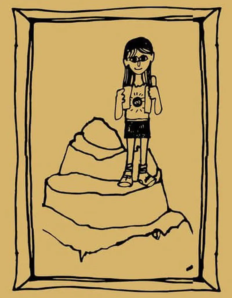 A framed photo shows a girl with straight hair and glasses holding a camera while standing on a mountain peak.