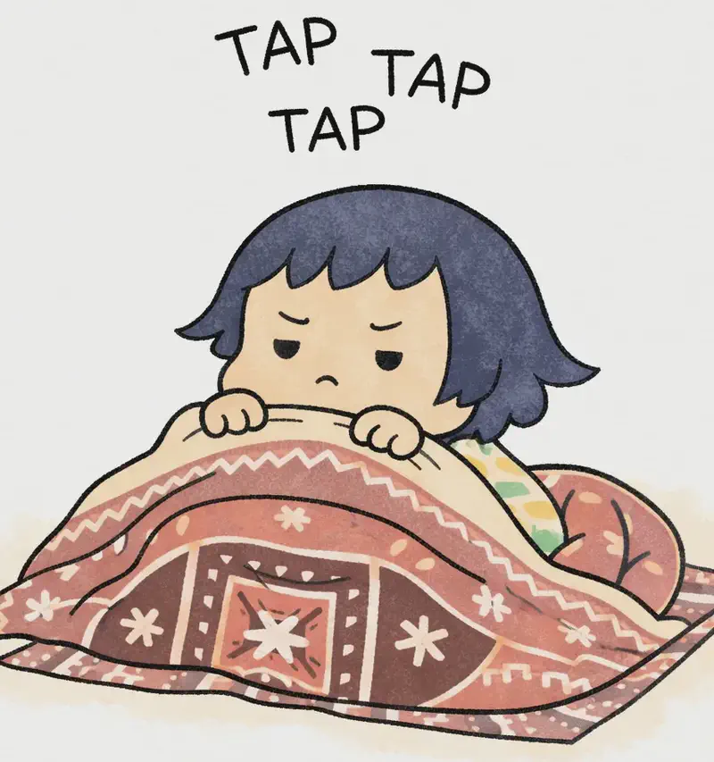 On the right side of the image, Kim lies on the rug pulling a blanket up toward her chin, frowning with an annoyed, sleepy expression as she's been woken by a tapping noise. Sound-effect text ("TAP TAP TAP") floats above her head, suggesting the persistent tapping. The scene is a close-up indoor afternoon view with warm light, and the patterned blanket is bunched around her.