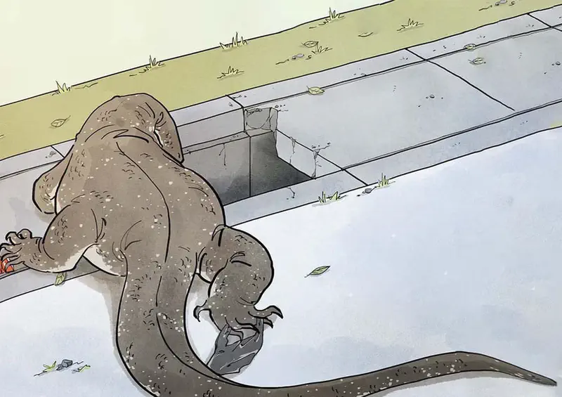 A large monitor lizard climbing out of a storm drain onto a sidewalk near grass and pavement.