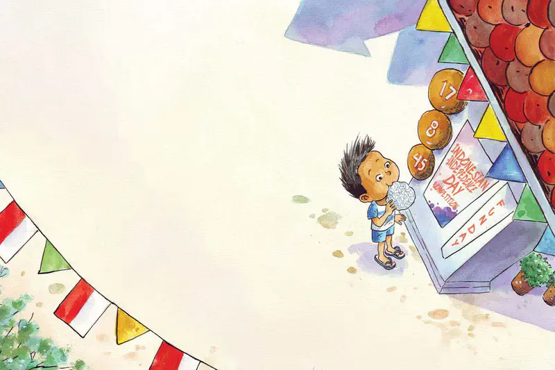 Boy eats a kerupuk cracker near an Indonesian Independence Day competition sign with numbered prizes and festive bunting decorations.
