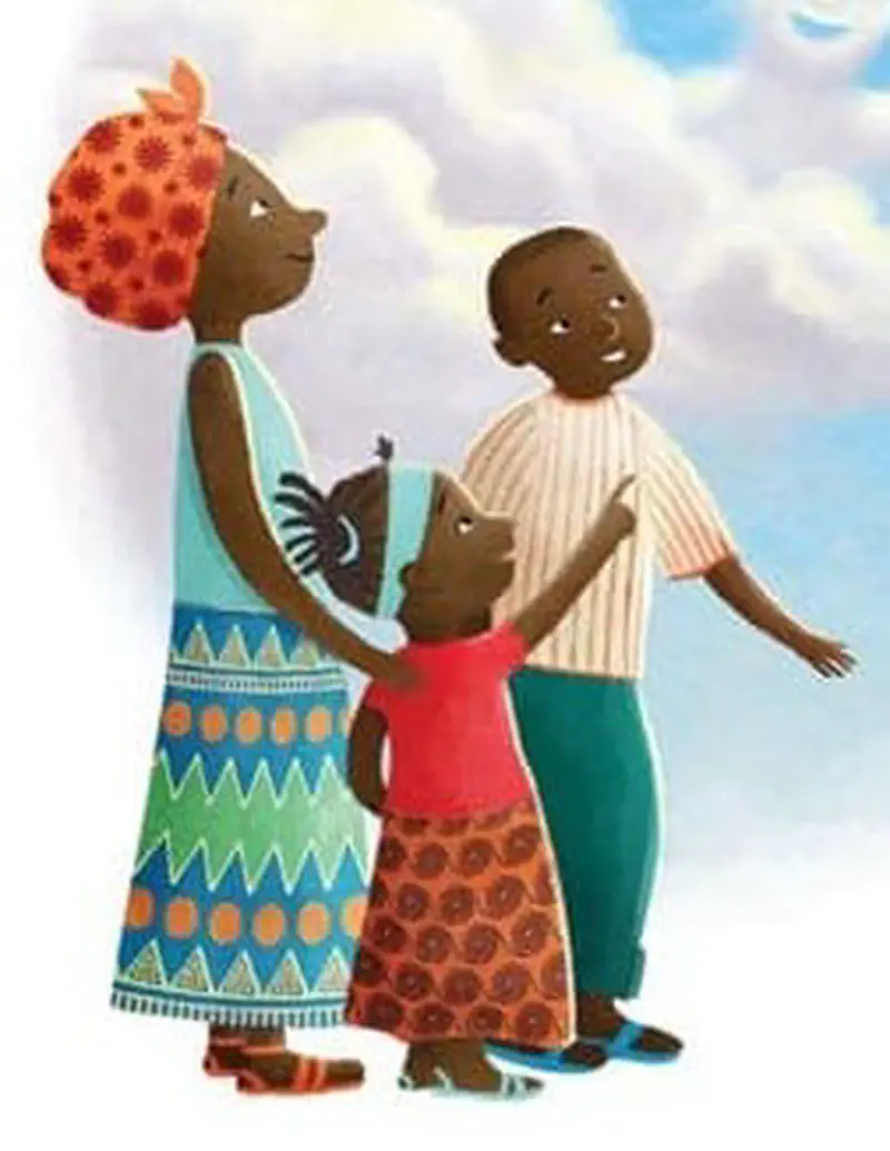 An African family wearing colorful traditional clothing stands together looking at the sky, with mother, father, and young daughter.
