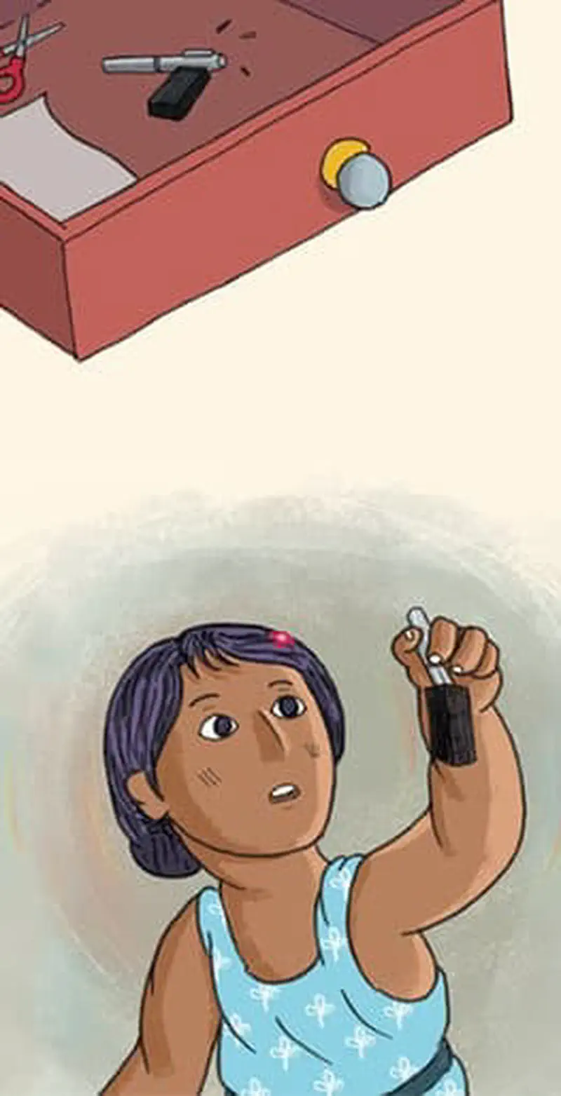 A girl holds up a shiny pen with a black block stuck to it. Above shows an open drawer with objects and a ping pong ball inside.