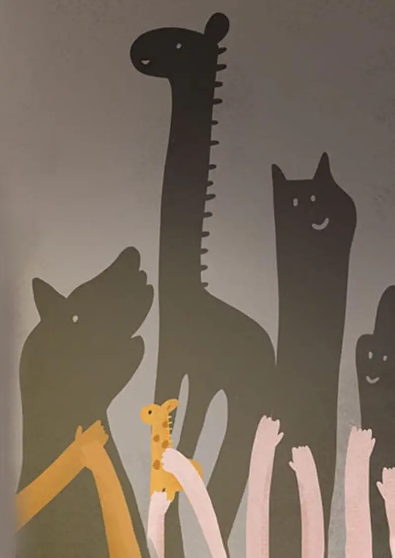 Shadow puppets of animal shapes on wall made by children's hands holding toy figures.