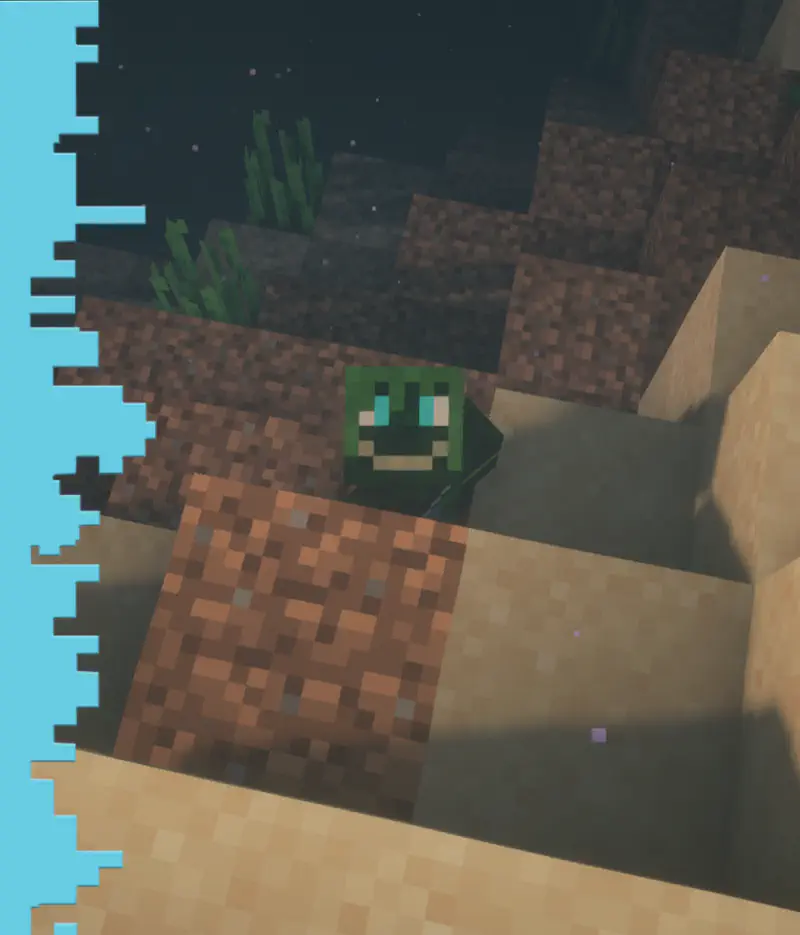 Underwater view of green Minecraft frog swimming near sandy seafloor with dirt blocks.