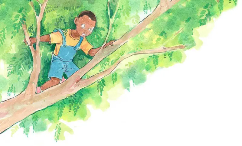 Boy in blue overalls and yellow shirt climbing high in leafy green tree branches.