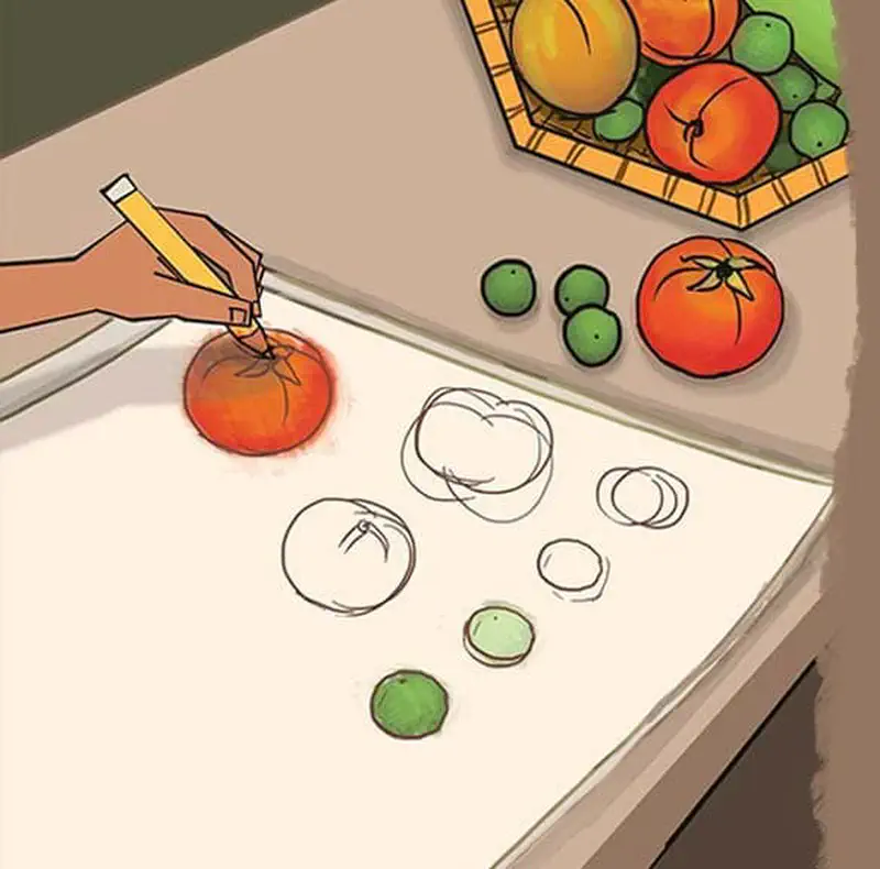 Hand drawing tomato on paper with sketches, real tomatoes and limes beside fruit basket.