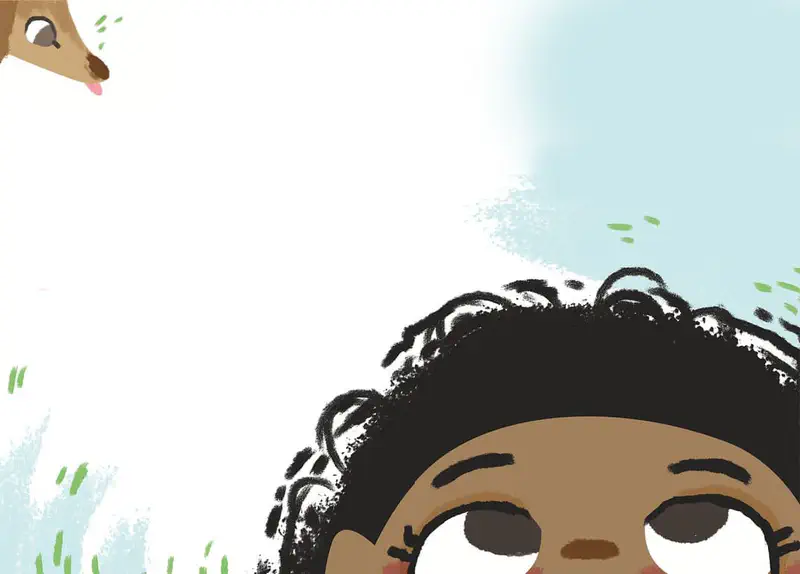 Top of girl's curly black hair visible with dog peeking from corner in grassy scene.