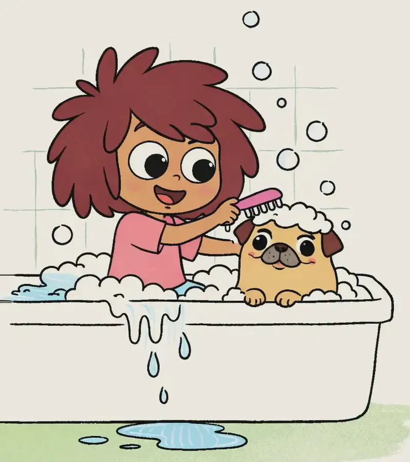 On the left side of the image, The Girl and the Pug are sitting together in a white bathtub filled with sudsy water and bubbles. The Girl is smiling warmly and scrubbing the Pug's head with a pink hairbrush, while the Pug — now revealed from under all the mud — sits in the foam looking content with a slight grin, showing its small wrinkly face. Bubbles float up into the air above them. The scene is set indoors in a bathroom with light green tiled walls, and water is splashing over the edge of the tub onto the green floor, forming a small puddle.