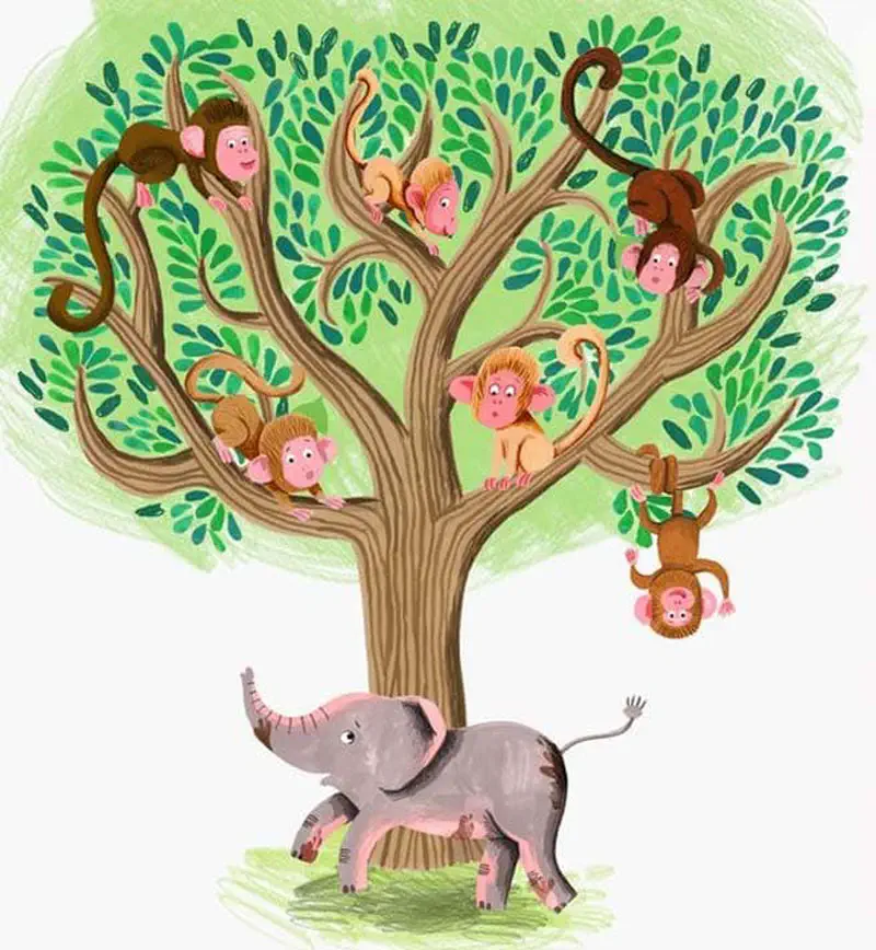 A baby elephant runs under a large tree full of playful brown monkeys sitting and hanging from branches.