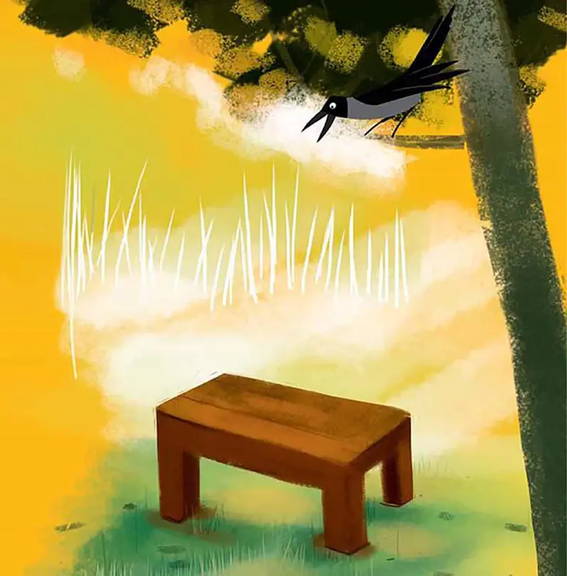 A black swallow bird flies near a tree above an empty wooden table in a golden meadow with tall white grass and green patches.