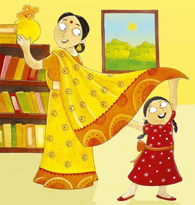 A mother in a bright yellow sari places flowers on a shelf while her daughter in a red polka dot dress playfully holds the flowing fabric.