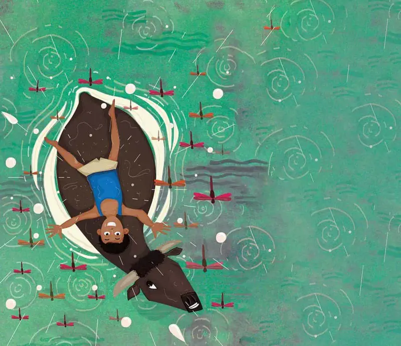 Aerial view of a boy riding on a water buffalo swimming in green water with colorful dragonflies and rain ripples all around them.