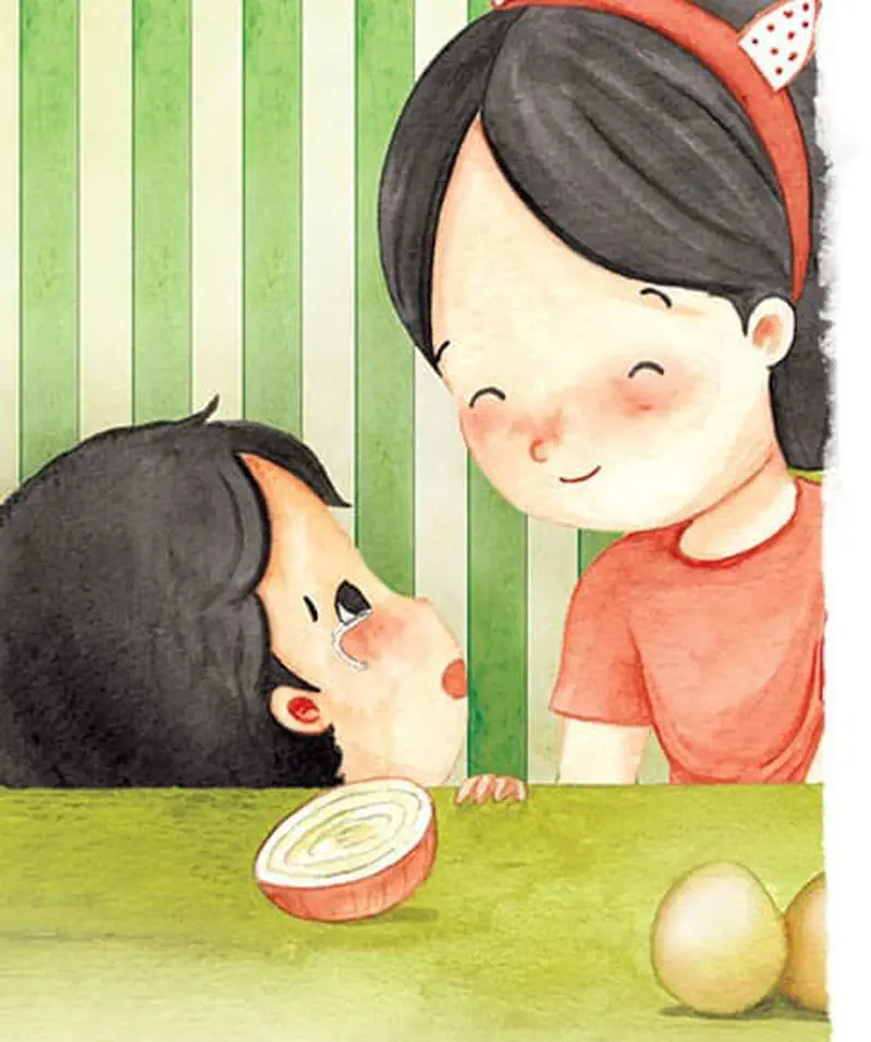 A boy rests his head on a table looking at an onion slice while his sister smiles behind him. They are in a kitchen with green striped wallpaper.