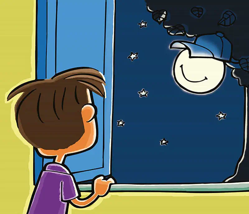 A boy in purple pajamas looks out a window at night, seeing the smiling moon wearing a cap among the stars.