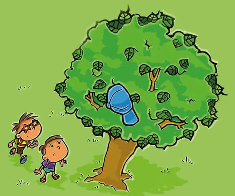 Two boys look up at a large green tree where a blue cap is stuck in the branches and leaves.