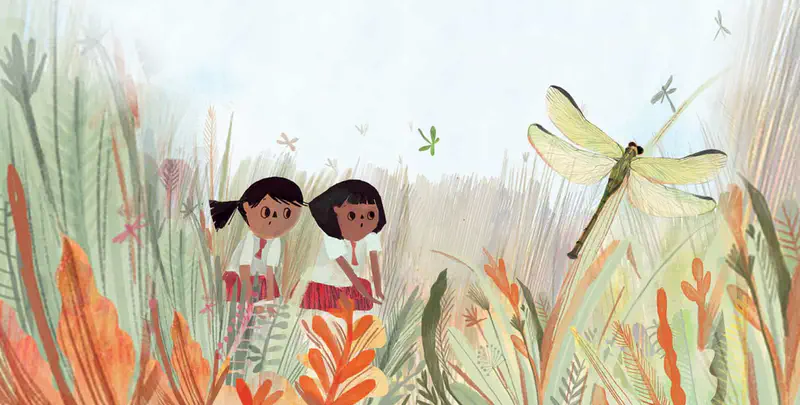Two girls in school uniforms discover a large dragonfly perched on a plant stem amid tall colorful grasses and foliage.