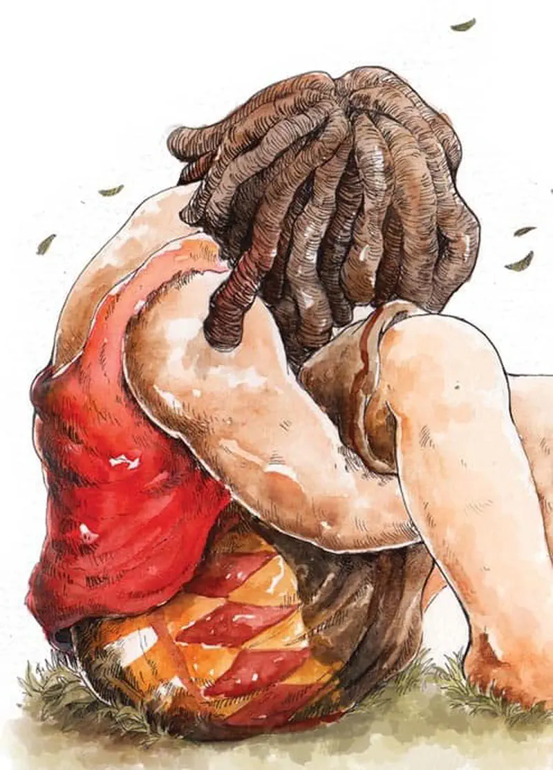 A giant with curly brown hair sits sadly on the grass, head buried in arms, wearing red and yellow checkered shorts.