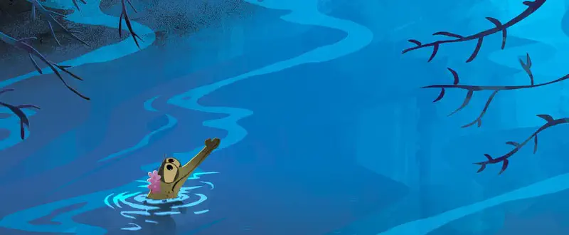 A small crocodile with a pink flower waves while swimming alone in a winding blue river with overhanging branches.