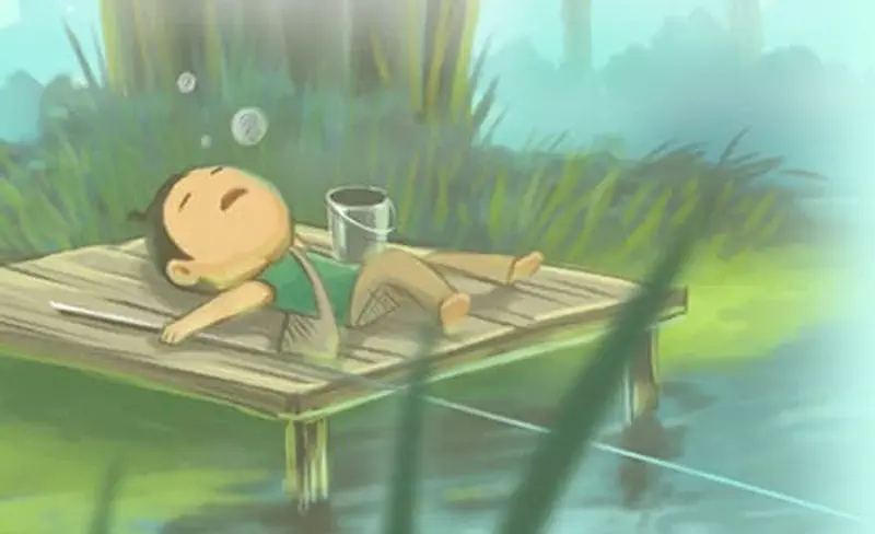 A boy relaxes on a wooden dock by a pond, lying back with eyes closed next to a bucket, surrounded by tall reeds.