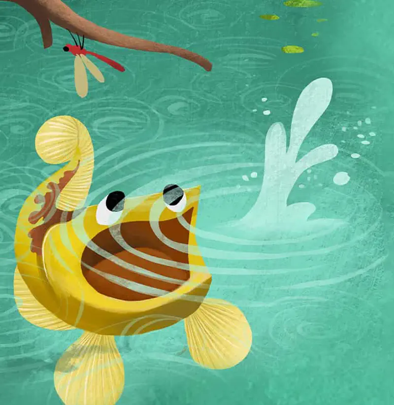 Yellow carp swimming in murky pond with tree roots above