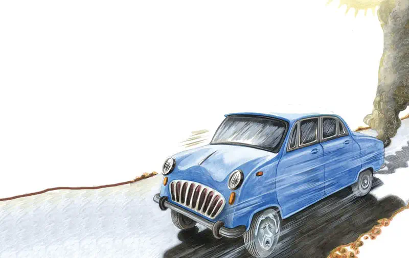 A vintage blue car drives quickly along a road past a tree trunk, casting shadows in the warm sunlight.