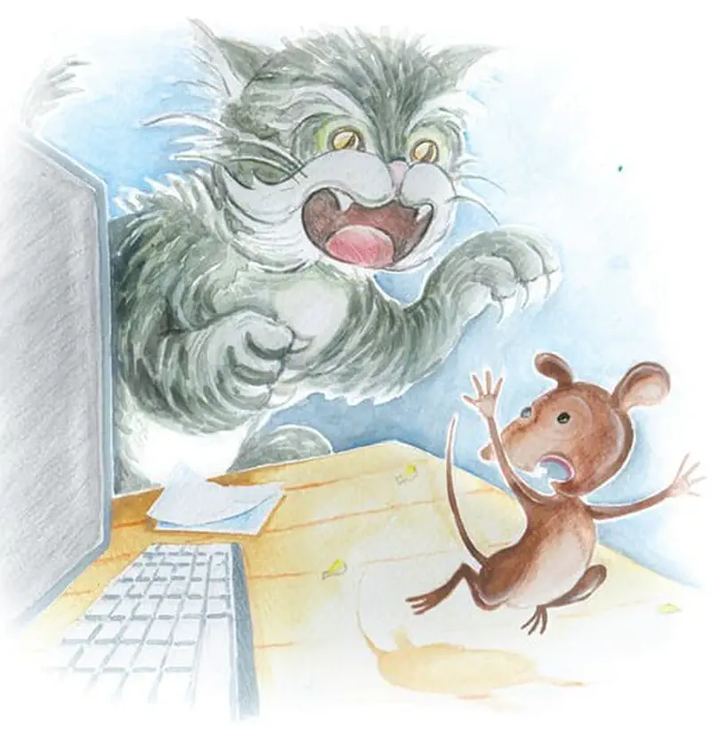 A menacing gray cat lunges toward a terrified brown mouse on a desk near a computer keyboard.
