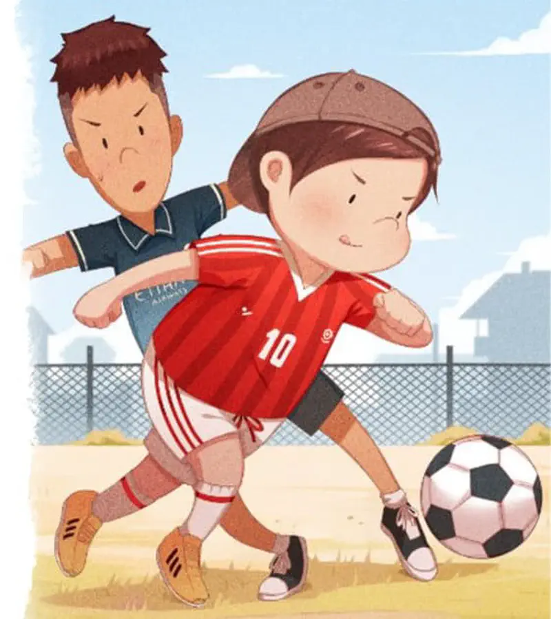 Two boys compete for a soccer ball on a dusty field, one in a red number 10 jersey with a cap and one in a blue jersey.