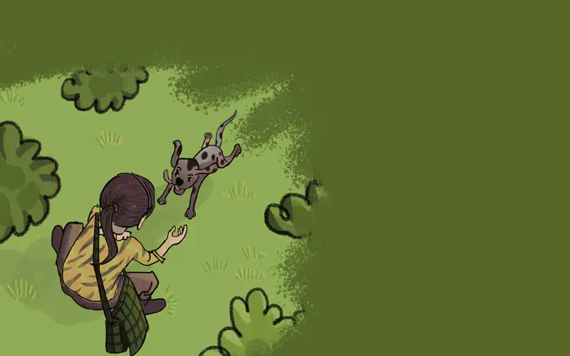 A girl with dark hair in a striped shirt chases a spotted dog across a grassy field surrounded by green bushes.