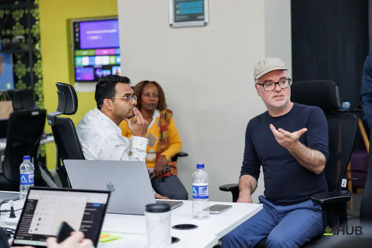 Adrian DeWitts of Bookbot (right) talking through the rollout with Shivad Singh (left) during the SEF onboarding in Nairobi